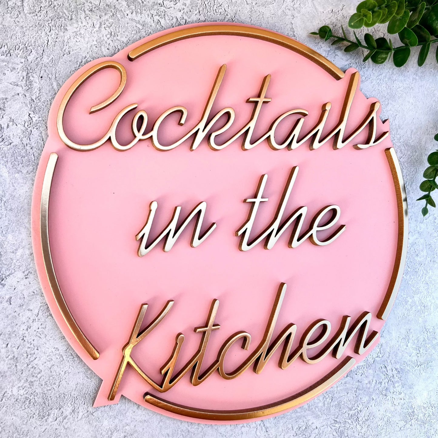 Cocktails in the kitchen sign in pink and gold