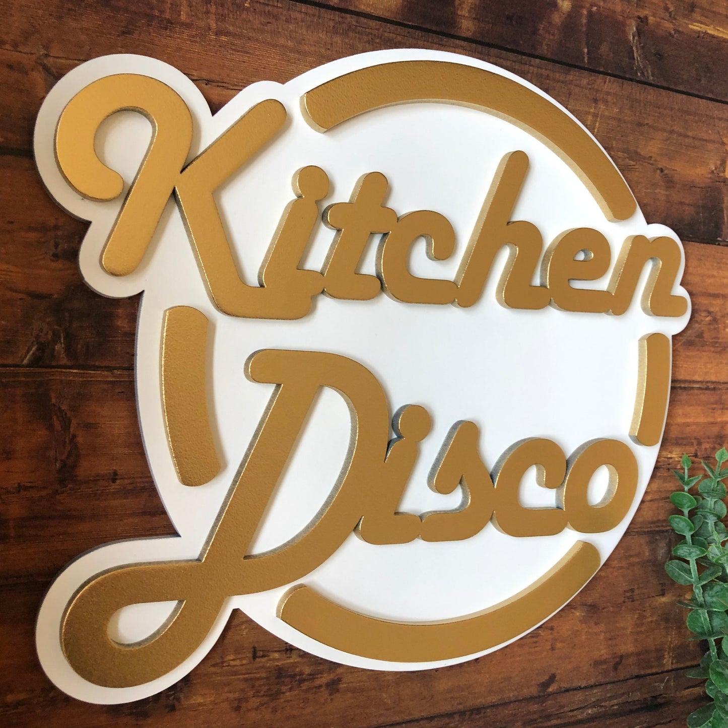 Kitchen Disco sign in white and gold